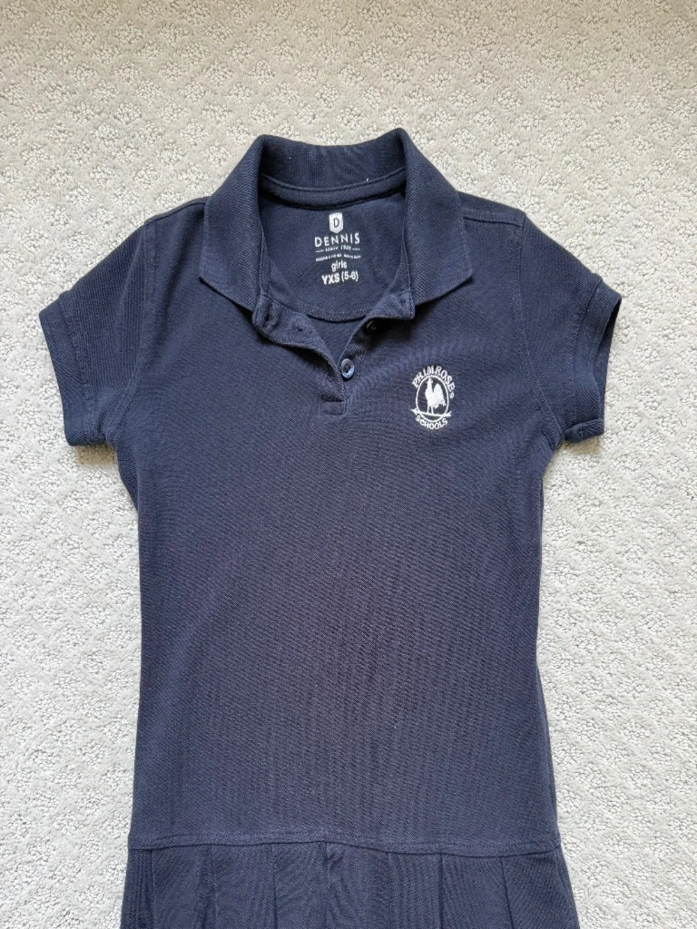 Primrose schools Dennis pleated pique polo dress